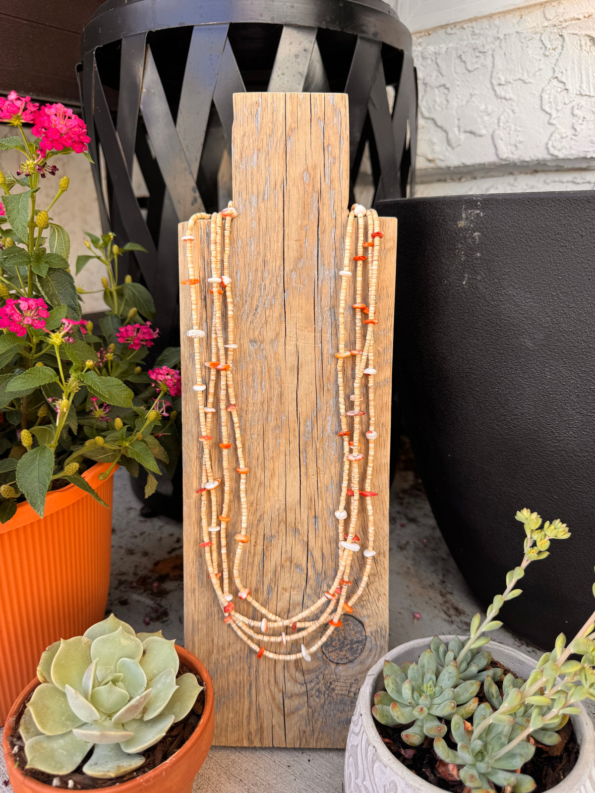 4 strands of spiny orange and shell beads (34 inches)