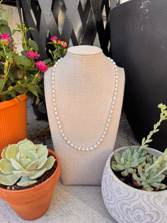 Fresh water Pearls with small silver beads (20 inches)